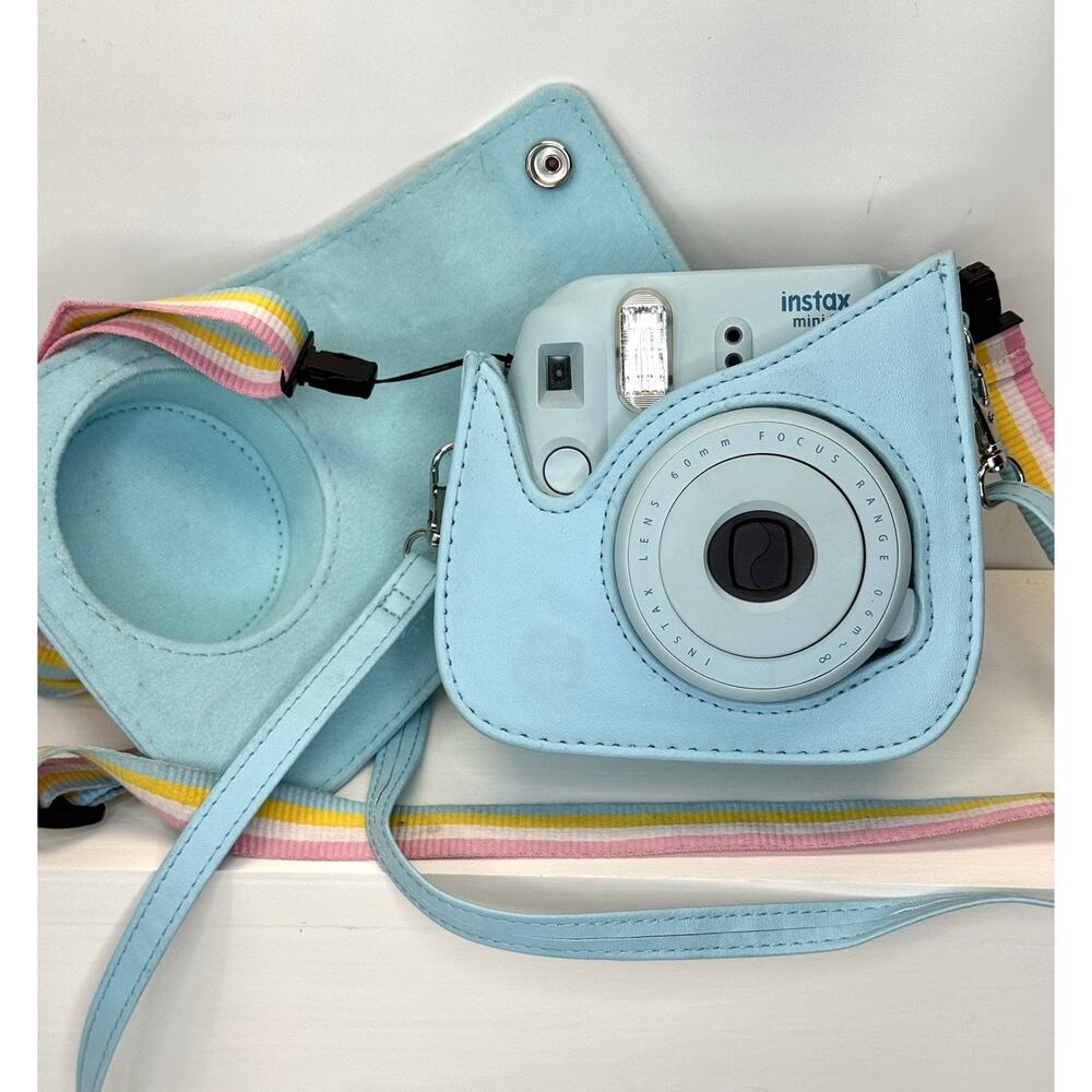 Fujifilm Instax Mini Instant Camera with Light Blue Case and Pastel Strap